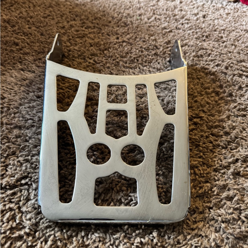 Silver motorcycle seat back cover rack